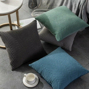 Decorative velvet pillow cover with herringbone texture, perfect for modern interiors