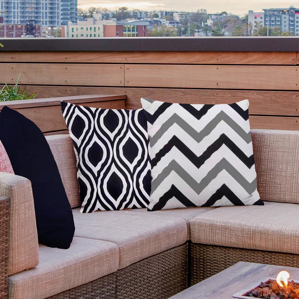 Black weatherproof cushion cover in 45x45cm size, perfect for outdoor seating