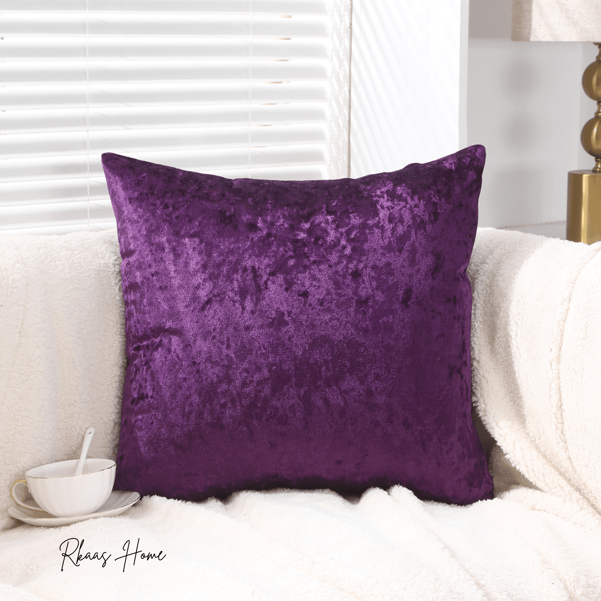 Close-up of purple velvet throw pillow for living room or bedroom