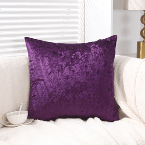 Soft purple crushed velvet cushion cover on a modern sofa